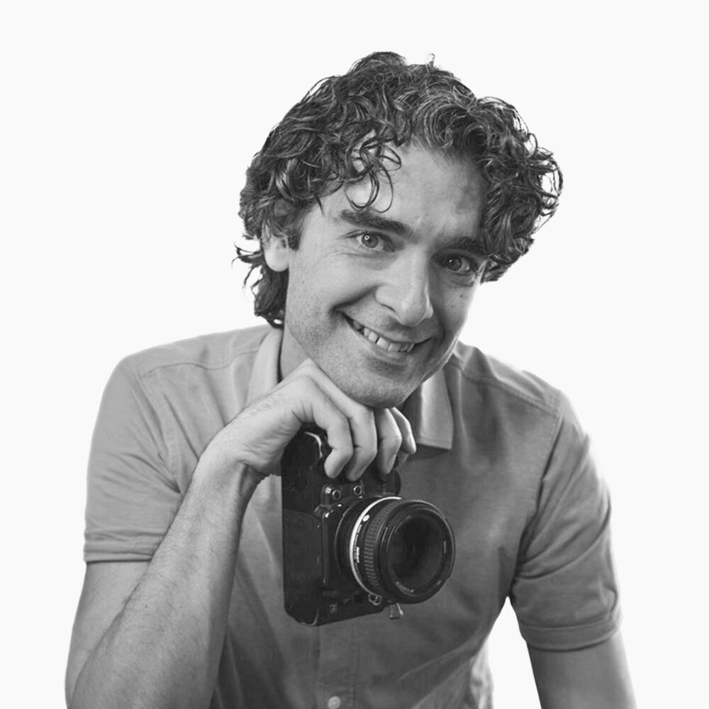 Lukas Peters holding a camera